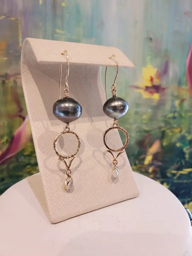 Handcrafted Pearl and Moon earrings in sterling silver with celestial engraving.