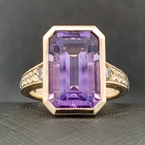 Emerald cut amethyst ring in 14k yellow gold custom setting