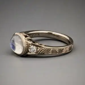 Artisan Lotus Moon Garden ring featuring hand-engraved floral and celestial details.